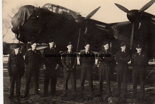 James McMillan with his crew-mates and Halifax bomber